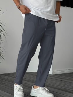 Image of Men's Pure Color Ribbon Pocket Casual Drawstring Trousers
